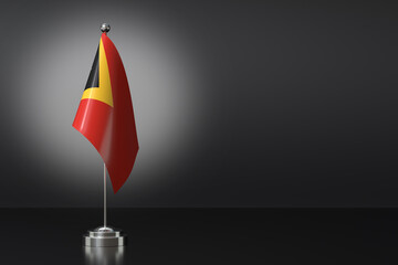 Small East Timor Flag in Front of Black Background, 3d Rendering