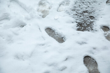  Feet prints on the snow. Winter