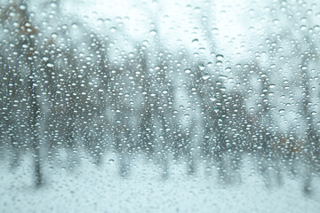 Closeup water drops on the glass.