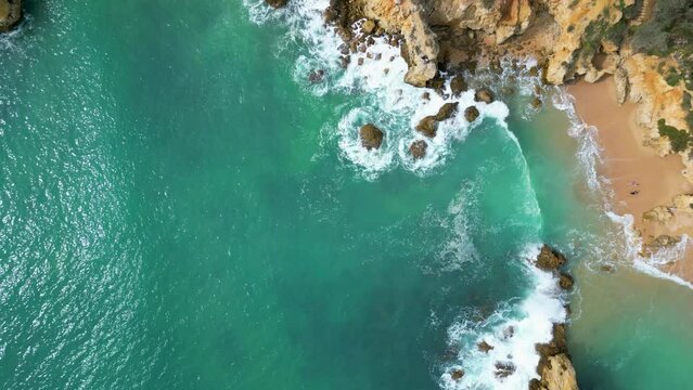 Praia dos Arrifes, a small lagoon beach on the coastline of Algarve, Portugal filmed with 4K drone.