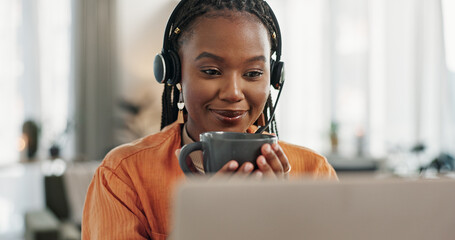Black woman, headset and coffee in home office with laptop and remote work and break in apartment. Virtual assistant at desk with computer, drink and relax with freelancer, consultant or crm agent.