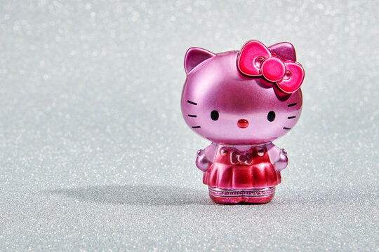 Hello Kitty with shade on glittering surface