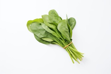 bunch of spinach leaves on a white surface