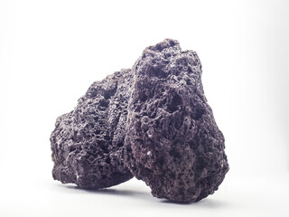lava rock isolated on a white background, this rock is the result of a volcanic eruption
