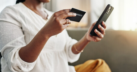 Woman, credit card and hands with phone for ecommerce payment, online shopping and fintech at home....
