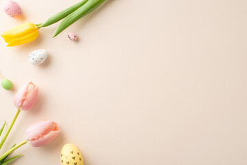 Meadow joy during Easter festivities. Top view of lively eggs, and fresh tulips against a pastel beige surface. Perfect for messages or advertisements