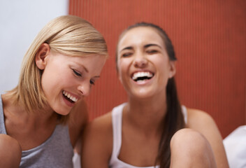 Women, friend and laughing for beauty, together and sleepover night out and bonding. Female, gossip...