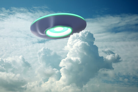 UFO. Alien spaceship among clouds in sky. Extraterrestrial visitors