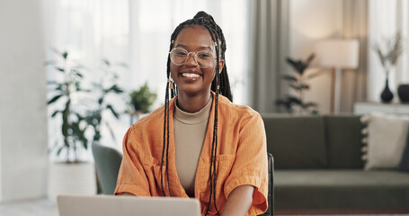 Black woman, portrait in home office and laptop for remote work, social media or blog research with smile in apartment. Happy freelancer at desk with computer for email, website or online in house. - obrazy, fototapety, plakaty