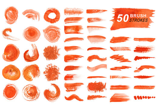 Collection of watercolor brush strokes and splatters isolated on transparent background.