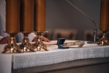 wedding rings in a box in the church
