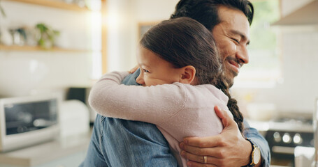 Children, father and daughter hug in the kitchen for love, trust or bonding together in their home. Family, smile and safety with a happy young man embracing his adorable girl child in their house - Powered by Adobe