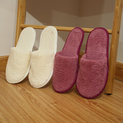 Bathrobe set - Hanger with clean bathrobe and towel on light wall bathrobe mockup