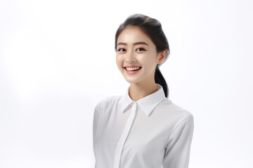 Charming Asian Employee, In a striking portrait, a young Asian businesswoman emanates elegance and professionalism against a simple white background. Generative AI.