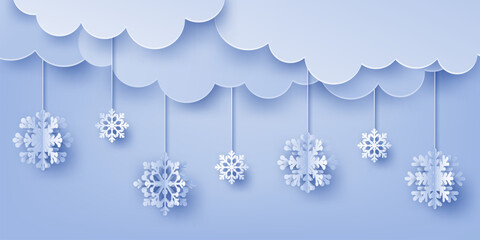 Paper cut style illustration, hanging snowflakes, vector illustration, on a blue background with clouds.