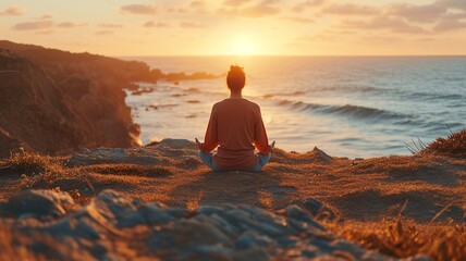 Fototapeta na wymiar Solitude Meditation at Sunrise Over Ocean: A Rear View