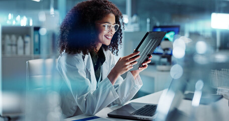 Tablet, laptop and woman scientist in lab working on medical research, project or experiment....