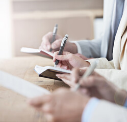 Hands, writing and meeting with business people in boardroom of office or seminar or upskill...
