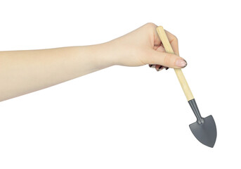 houseplant care shovel in hand, outstretched hand with houseplant care shovel isolated from...