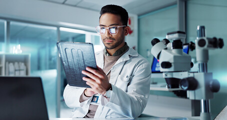 Tablet, scientist and reading for analysis in laboratory, healthcare and online pharmaceutical research . Asian expert, computer and microscope for medicine and information on innovation cure at work - obrazy, fototapety, plakaty