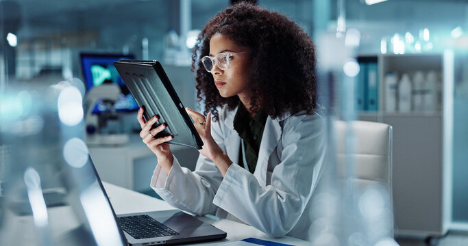 Tablet, scientist and happy for research in laboratory, healthcare and reading of online pharmaceutical innovation. Woman doctor, technology or connection for analysis or information in biotechnology