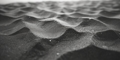 A simple black and white photo of sand. Suitable for various design projects