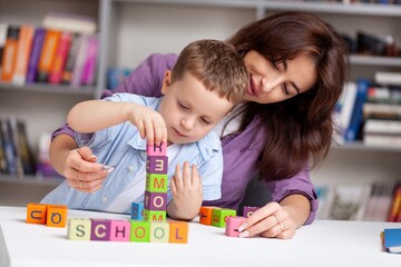 Fototapeta premium Teacher learning child in classroom School education conceptav