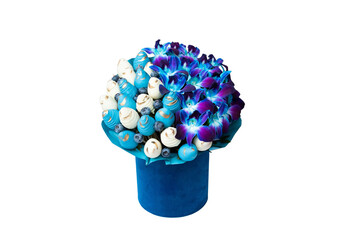 Bouquet of flowers isolated on white background. Fresh strawberry covered by blue and white chocolate with berries and blue dendrobium orchid flowers.