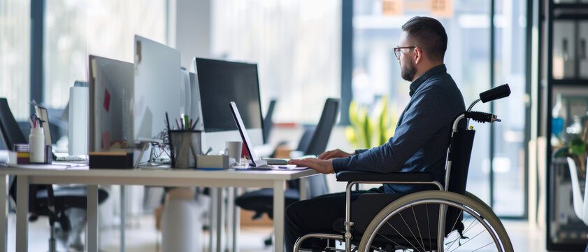 A professional in a wheelchair embodies inclusion, working diligently in a modern office..