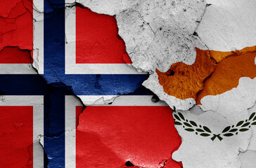 flags of Norway and Cyprus painted on cracked wall