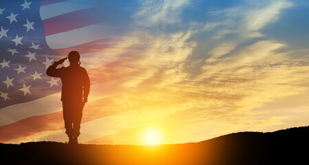 Silhouette of soldier saluting on background of USA flag. Greeting card for Veterans Day, Memorial...