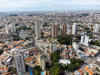 Fototapeta na wymiar São Paulo megalopolis full of buildings seen from above by drone