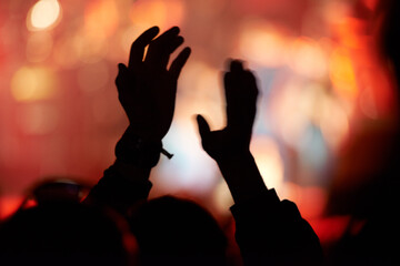 Silhouette, hands and clap at music festival for concert entertainment for celebration, news years...