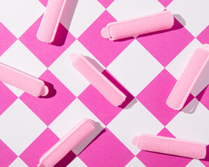 Sponge hair rollers, creative retro style background, beauty care, hair styling.