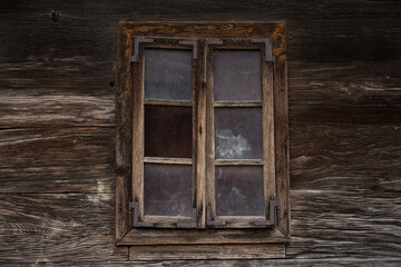 Croatia, October 20,2023 : Rustic style aged window at rural home wall.
