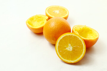 Fresh ripe juicy oranges on light background