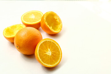 Fresh ripe juicy oranges on light background