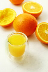 Fresh ripe juicy oranges on light background