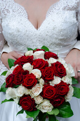 wedding bouquet and gown detail
