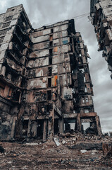 destroyed and burned houses in the city during the war in Ukraine