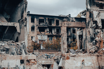 destroyed and burned houses in the city during the war in Ukraine