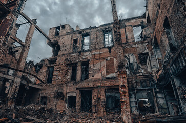 destroyed and burned houses in the city during the war in Ukraine