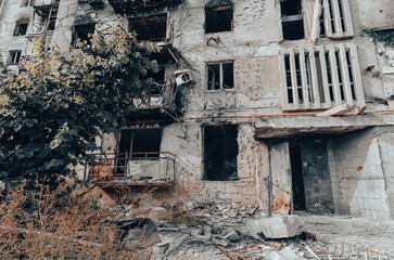 destroyed and burned houses in the city during the war in Ukraine