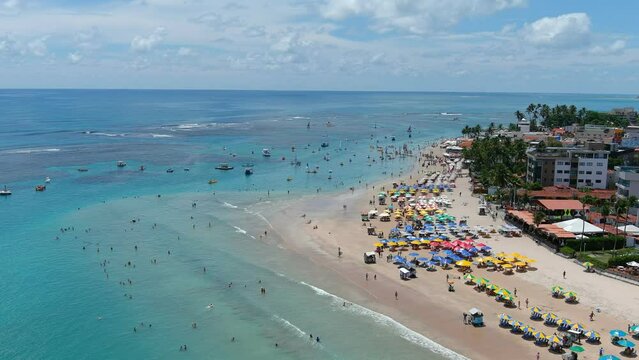 Porto de Galinhas (Port of Chickens). Beach. One&nbsp;of Brazil's&nbsp;most popular&nbsp;beach destinations, It's&nbsp;  home to several large resort hotels that attract&nbsp;dense holiday&nbsp;crowds.