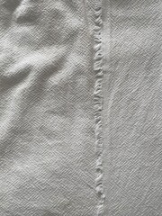 beige day blanket of a bed