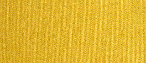 Close-up yellow or golden mustard fabric surface texture. Brown texture for background, surface golden