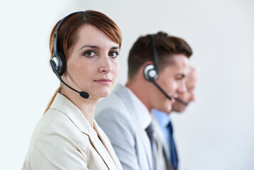 Call center, serious or portrait of woman in customer service, business support and CRM in office. Face, advisor or telemarketing agent in mic headset ready for telecom consulting in coworking agency