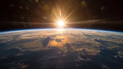 Fototapeta na wymiar Sunlight Ascending over Earth in Outer Space