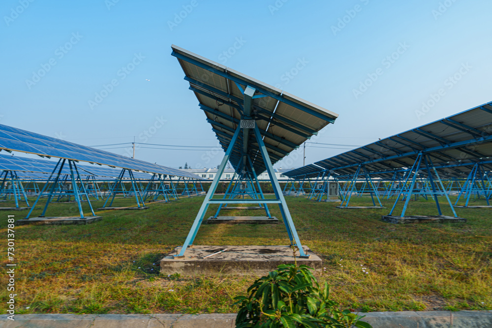 Wall mural Solar Photovoltaic of solar farm view, solar plant rows array of on the water mount system Installation in earthen pond, water storage. Floating solar or floating photovoltaics (FPV)	
 - Wall murals