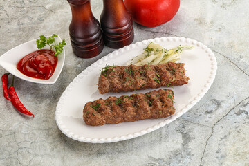 Kebab with beef served onion